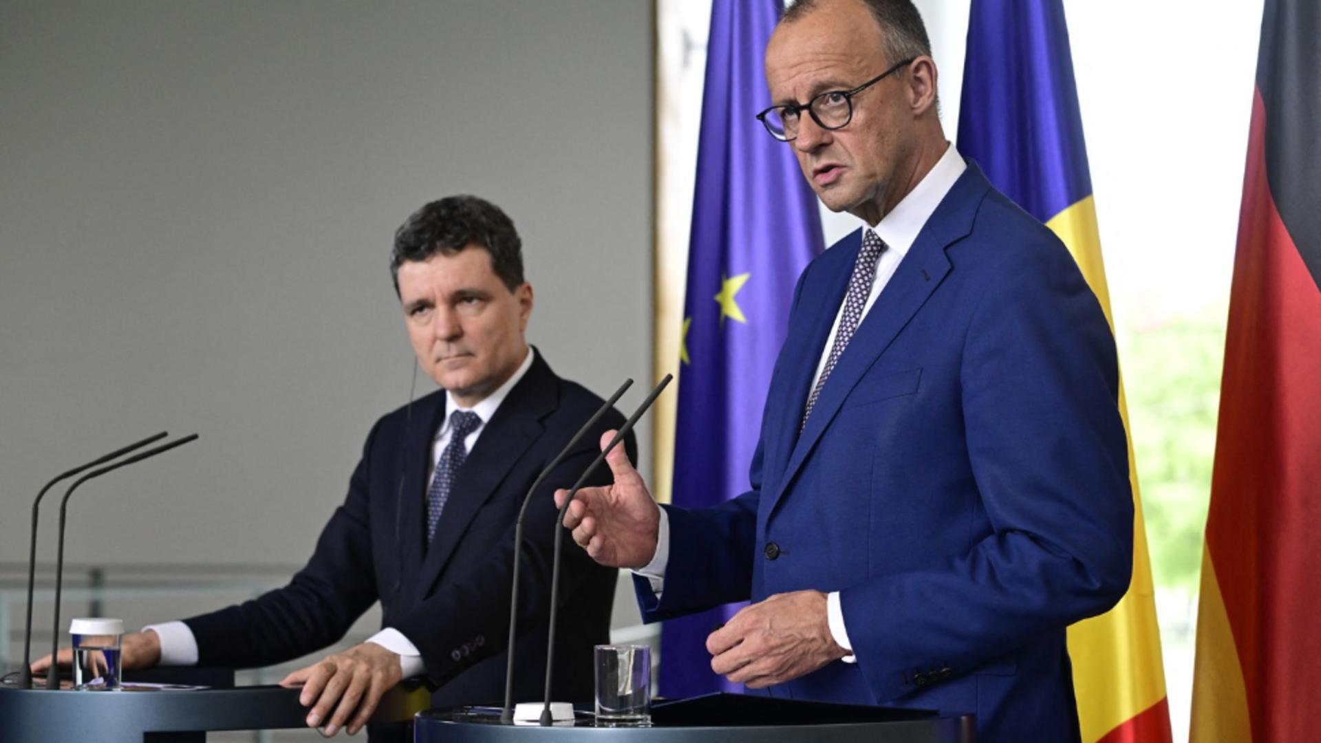 Nicușor Dan și Friedrich Merz. Foto: Profimedia