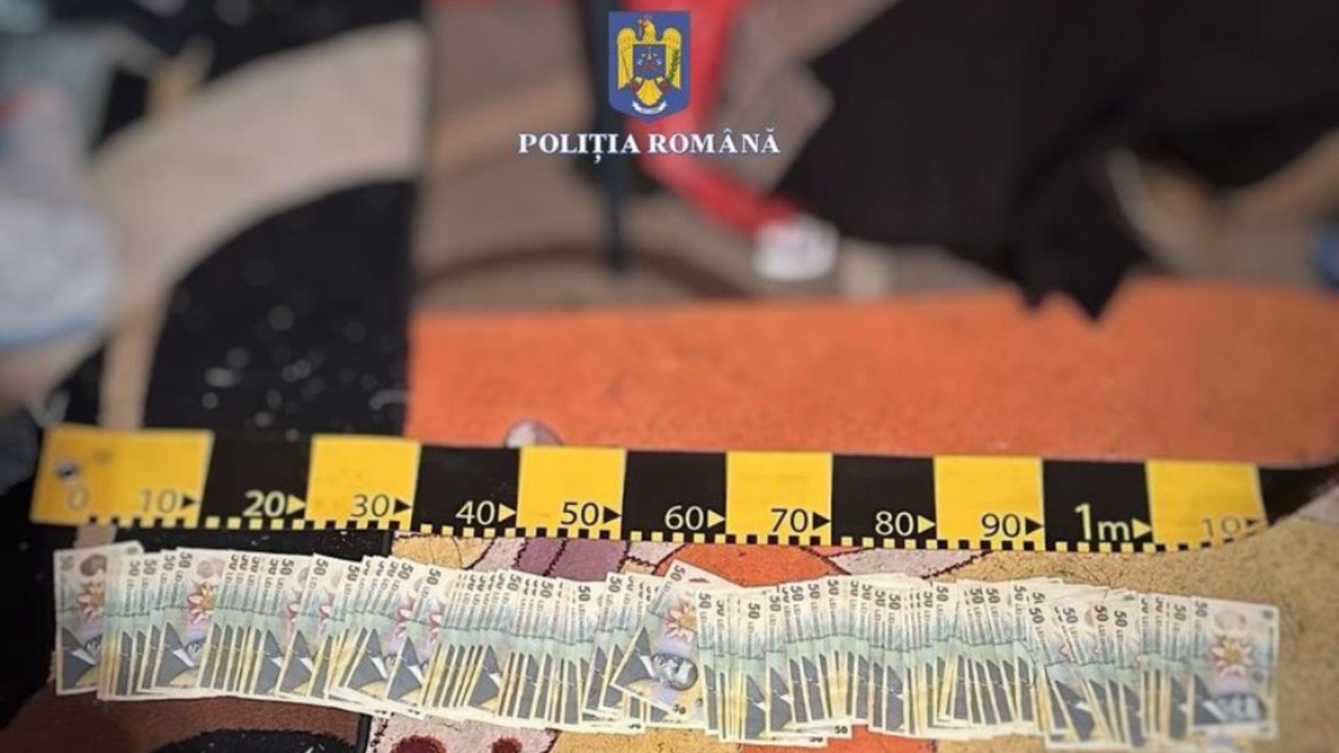 Trei bărbați reținuți după un furt de 30.000 de euro la Târgu Mureș. O parte din bani, găsită îngropată sub podea