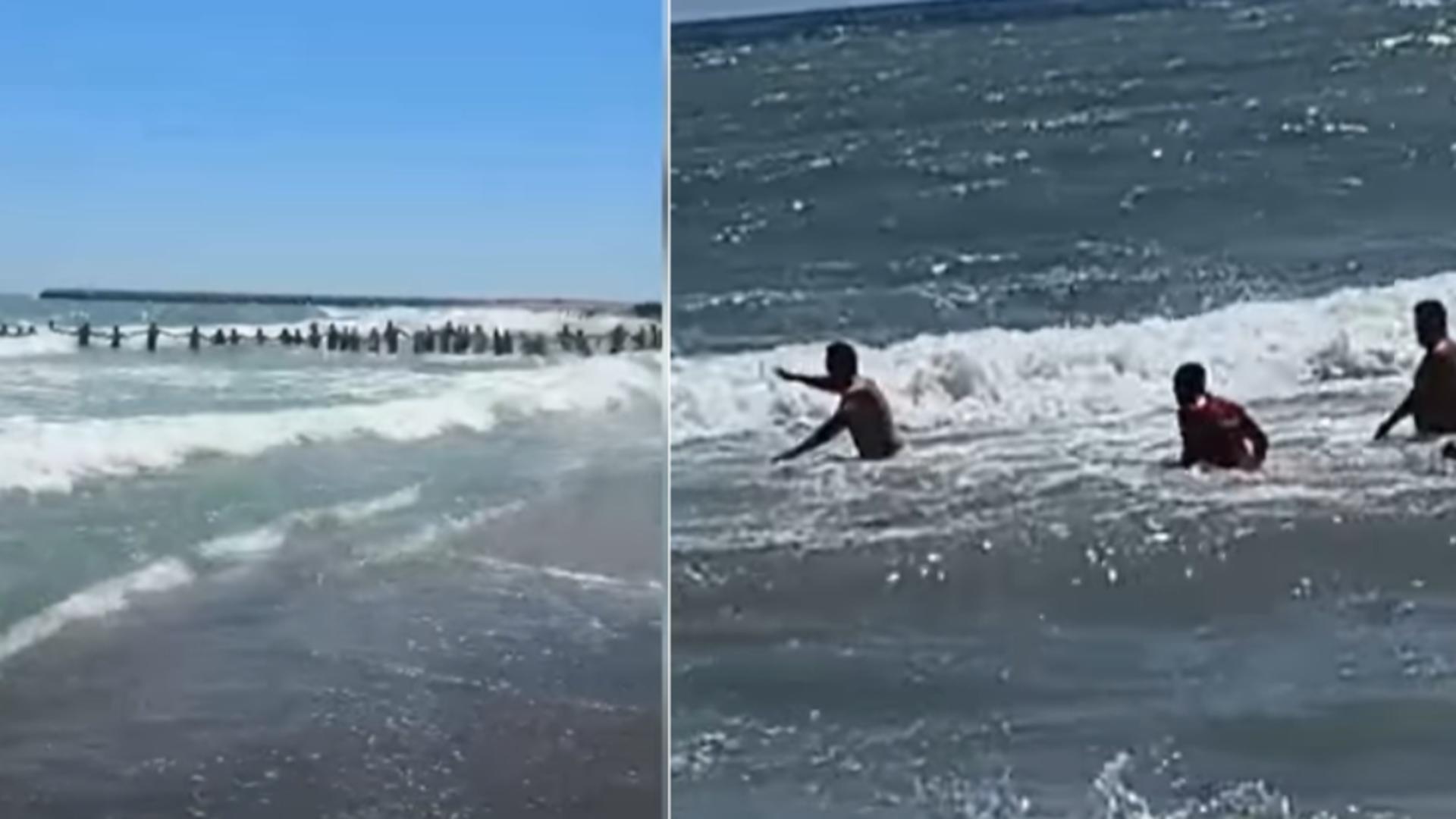Video. Lanț uman pentru salvarea unor turiști care s-au aventurat în apele mării, chiar dacă era arborat steagul roșu. Din păcate, un tânăr a murit