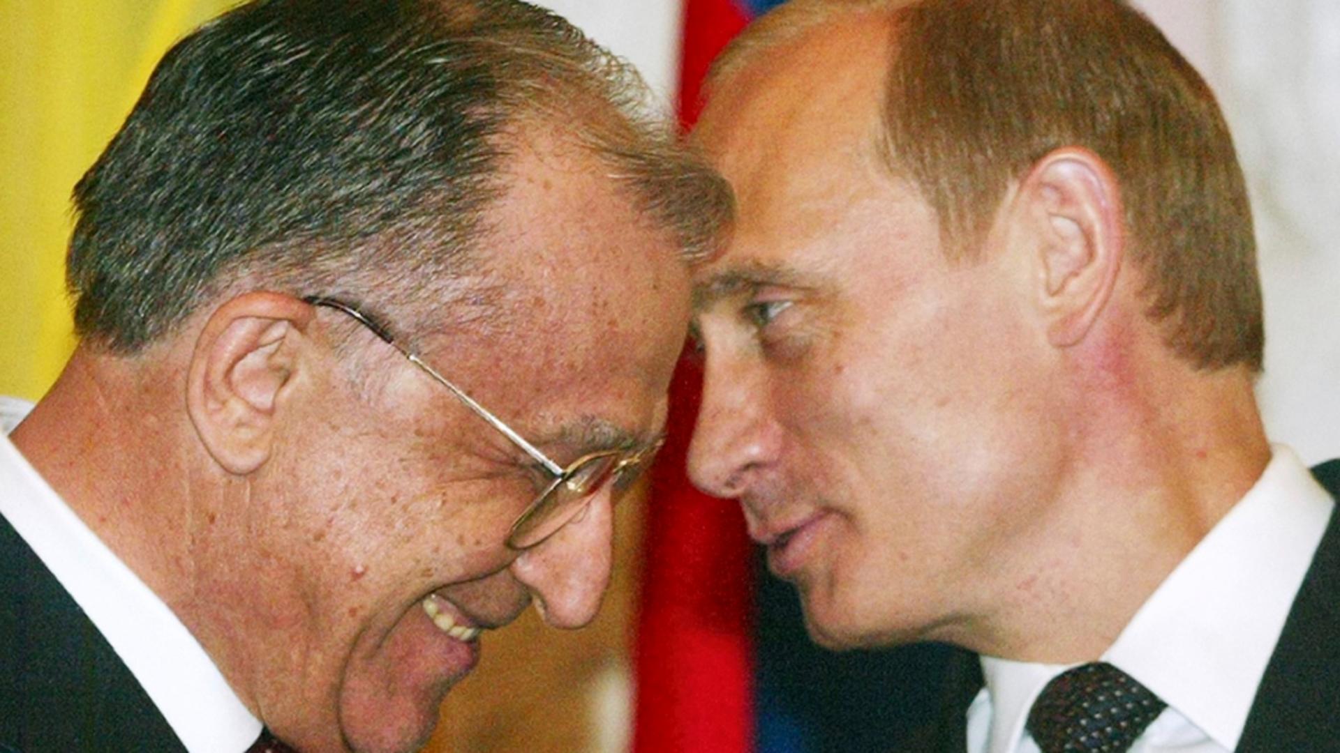 Ion Iliescu și Vladimir Putin. Foto: Profimedia