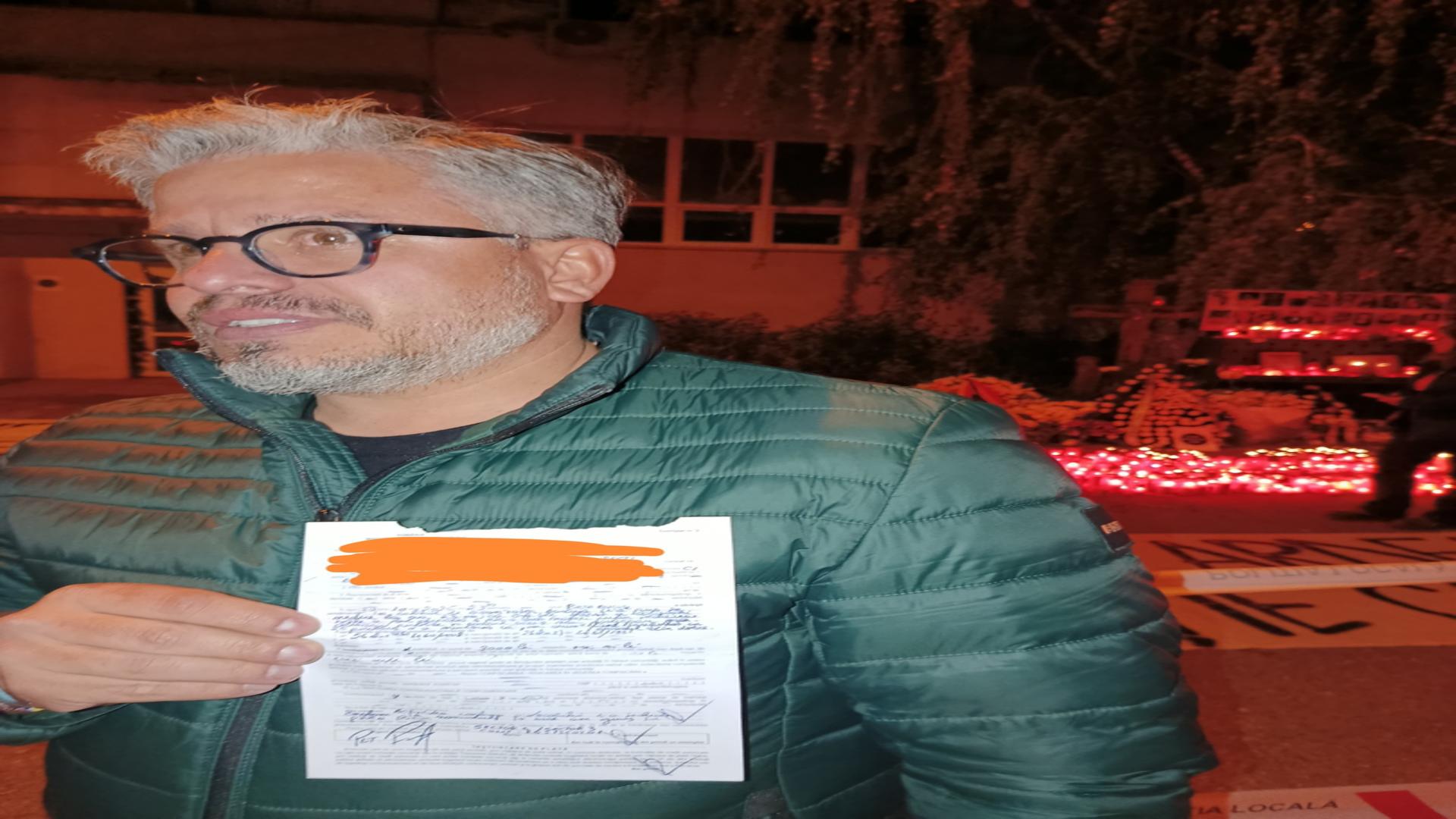 Marian Rădună,organizatorul marșului, prezintă procesul verbal