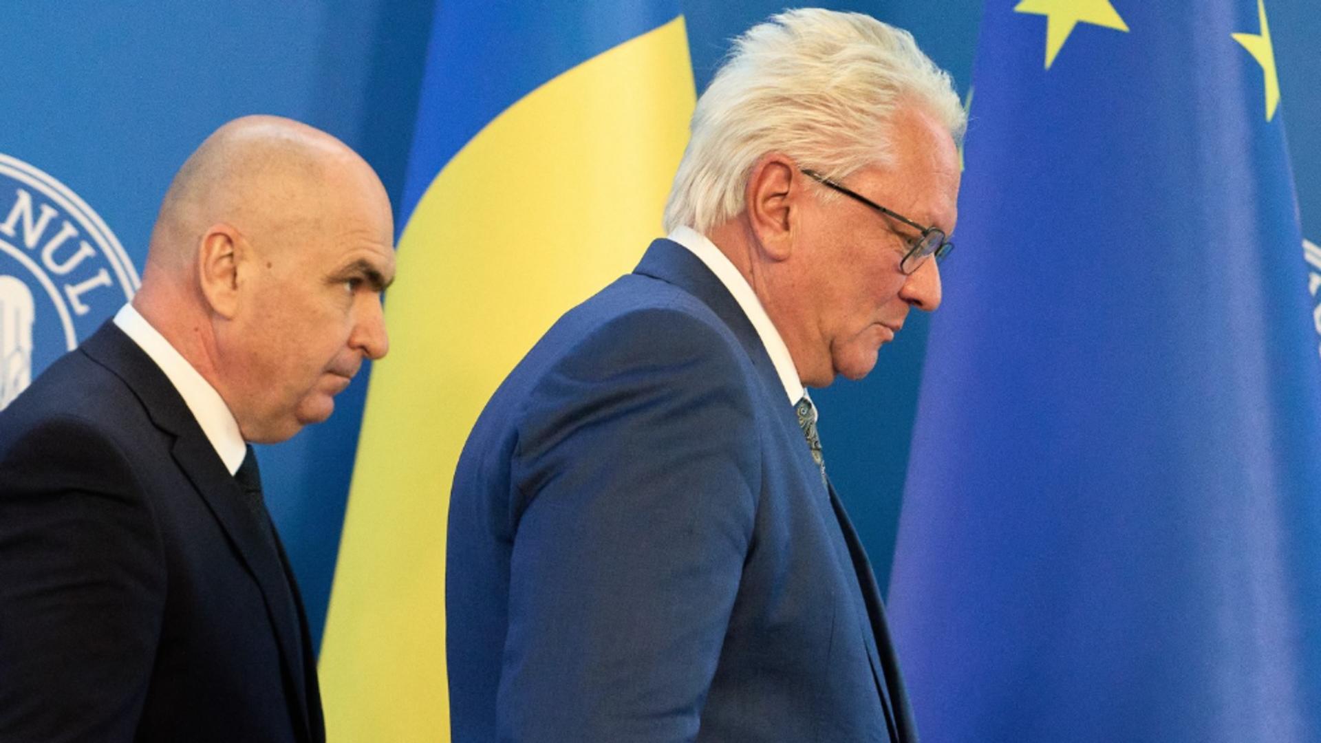 Ilie Bolojan alături de directorul general Rheinmetall AG, Armin Papperger. Foto: Profimedia