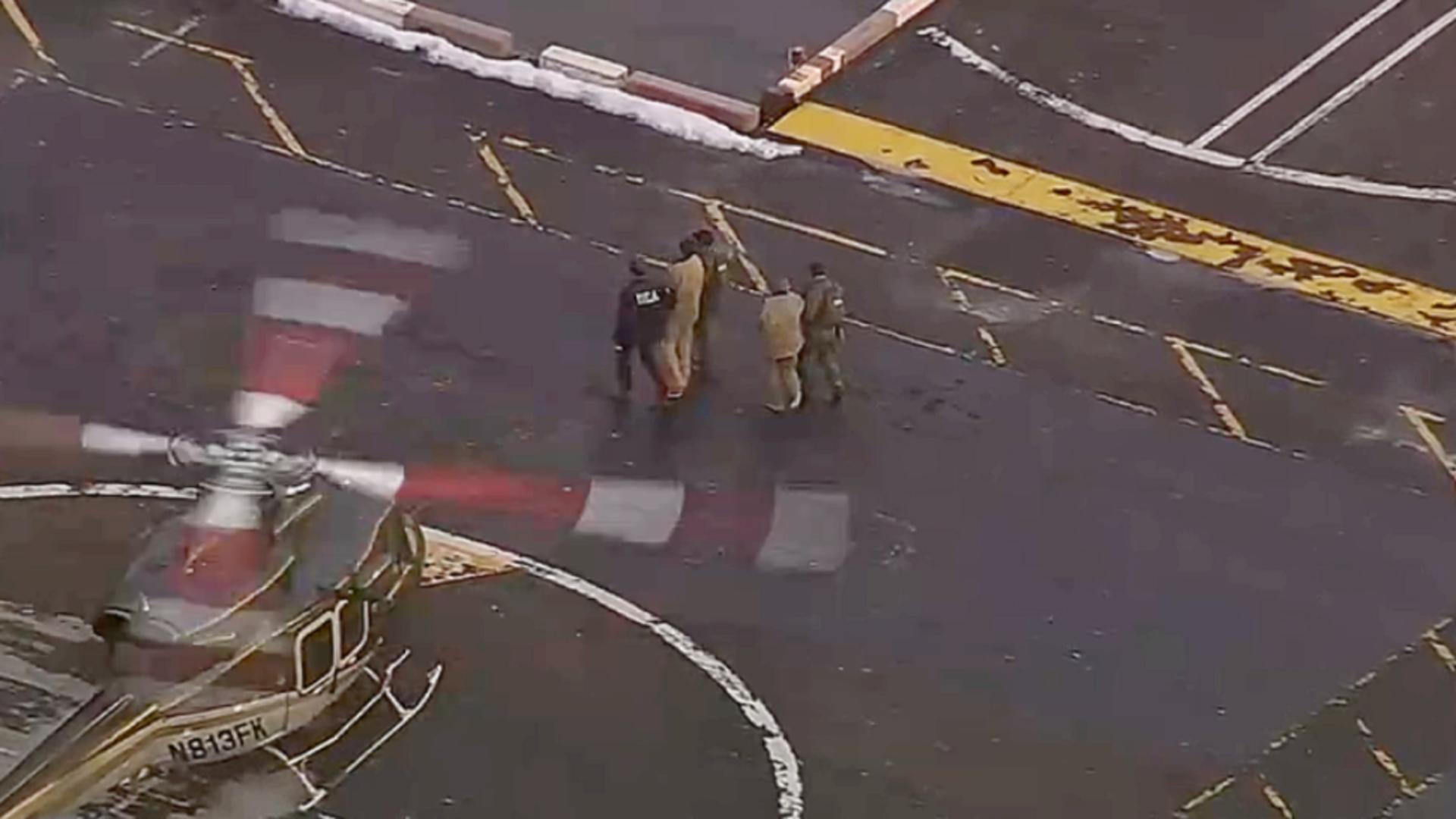 Imagini cu Maduro și partenera sa, încătușați (captură video)