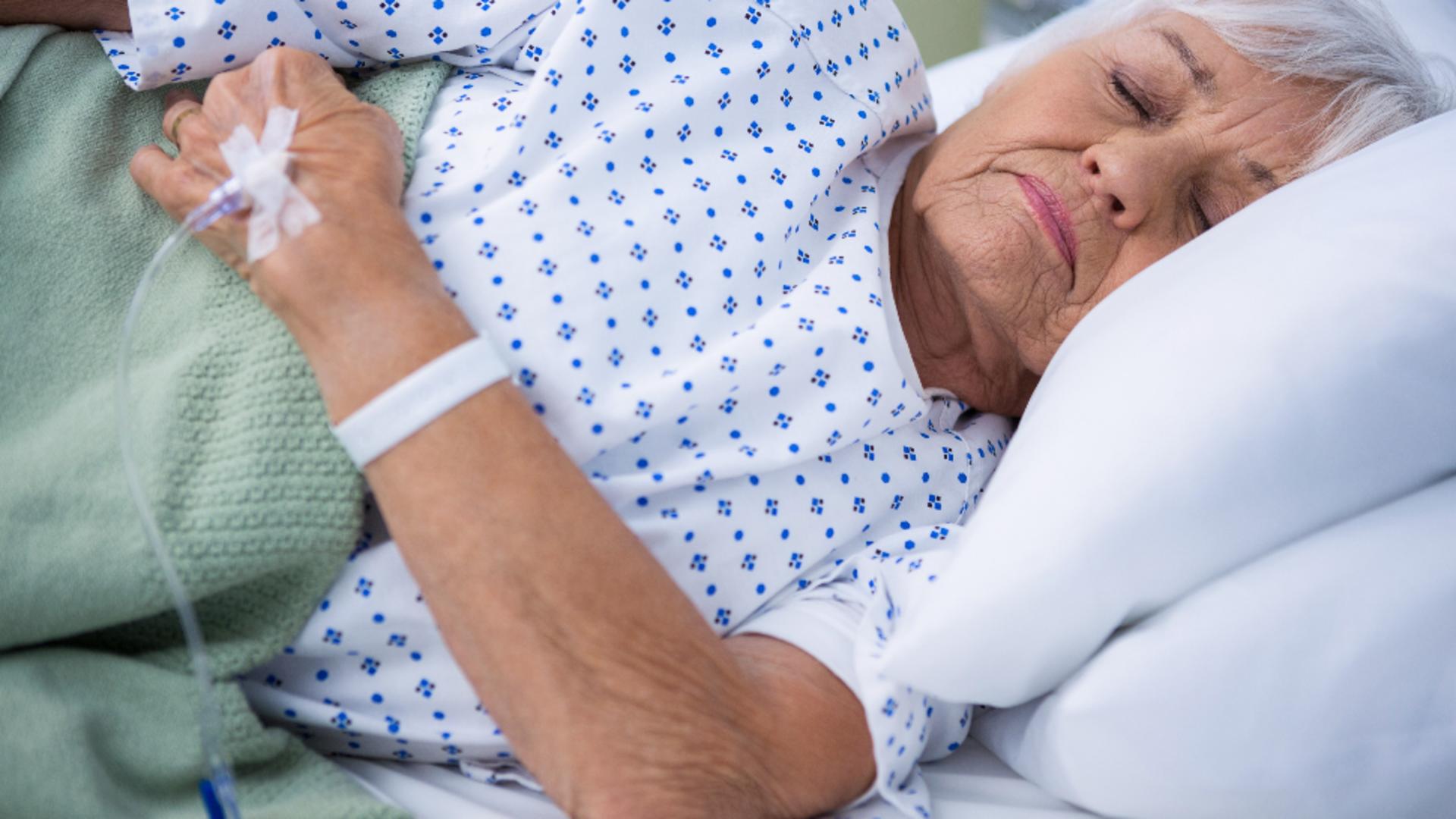 Avertisment dur: tăierea indemnizațiilor bolnavilor de cancer, echivalentă cu un genocid/ Profimedia