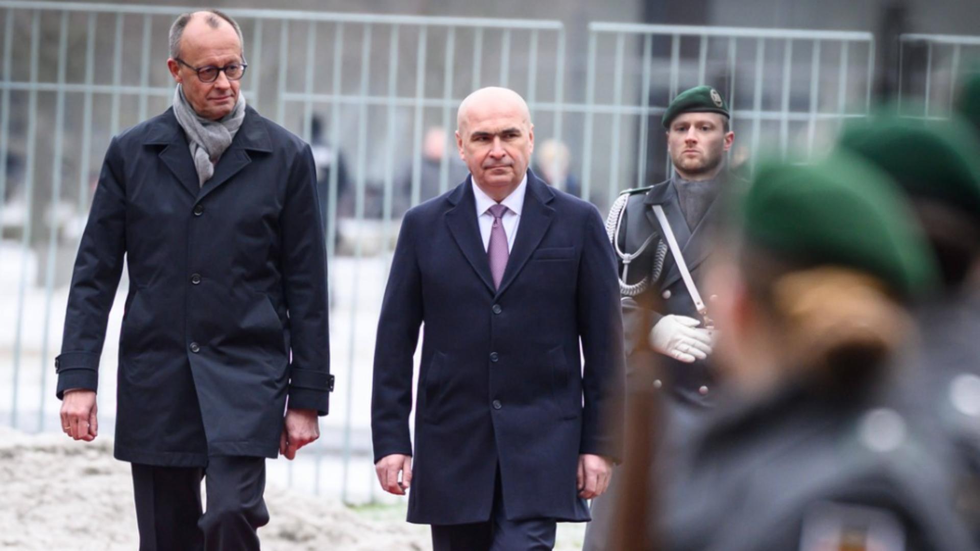 Întâlnire Friedrich Merz-Ilie Bolojan. Foto: Profimedia