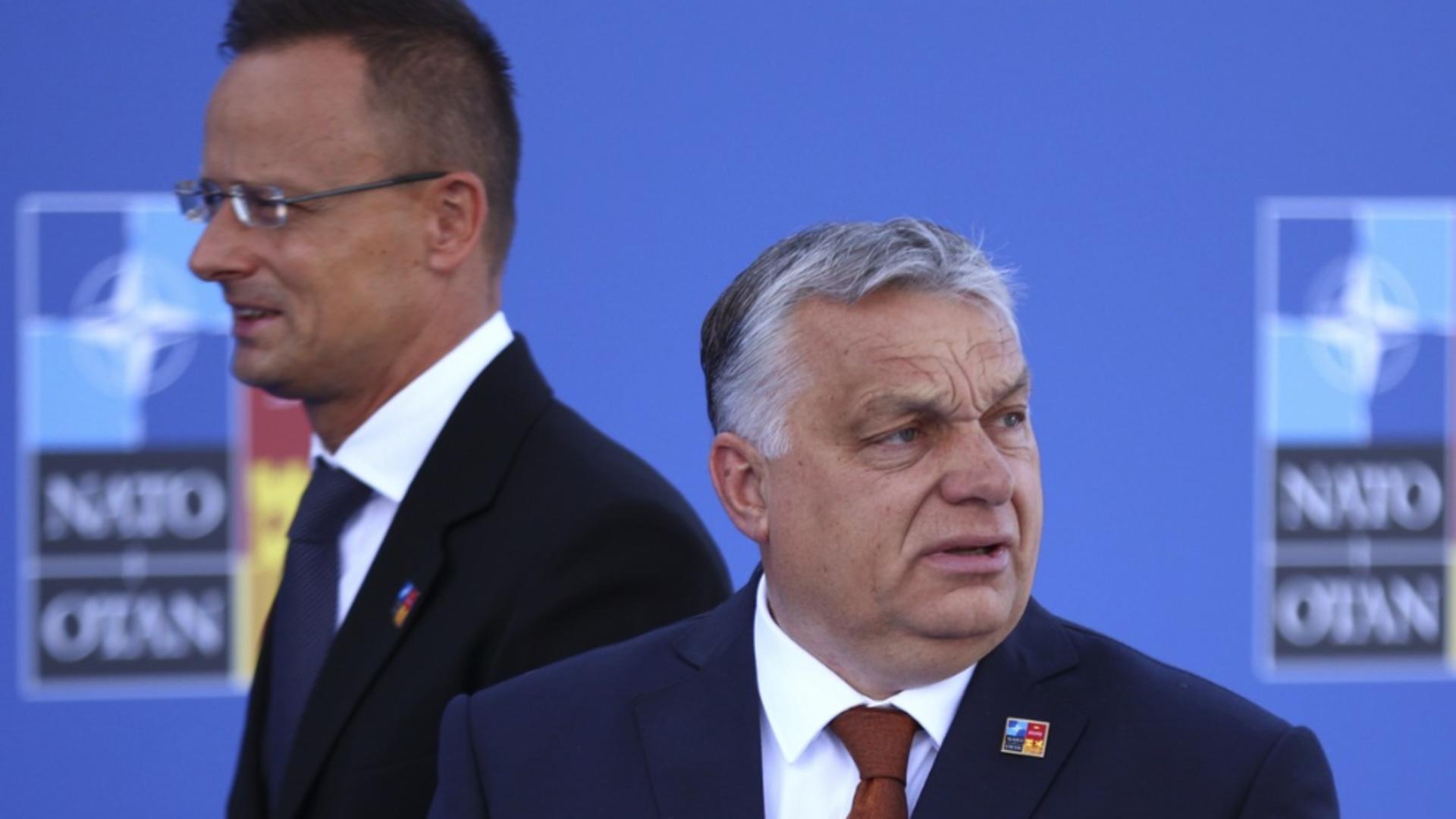 Peter Szijjarto și Viktor Orban. Foto: Profimedia